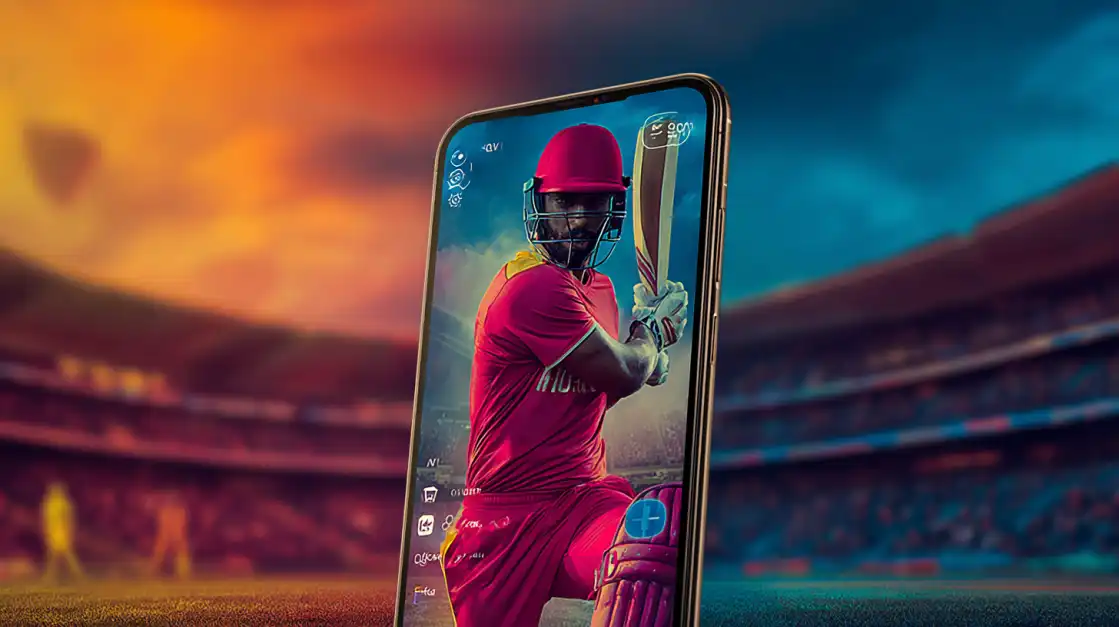 A close-up of a smartphone held in a stadium, displaying a cricket player in a vibrant pink uniform ready to bat. Catch all the live action and bet on the go with CVC666.